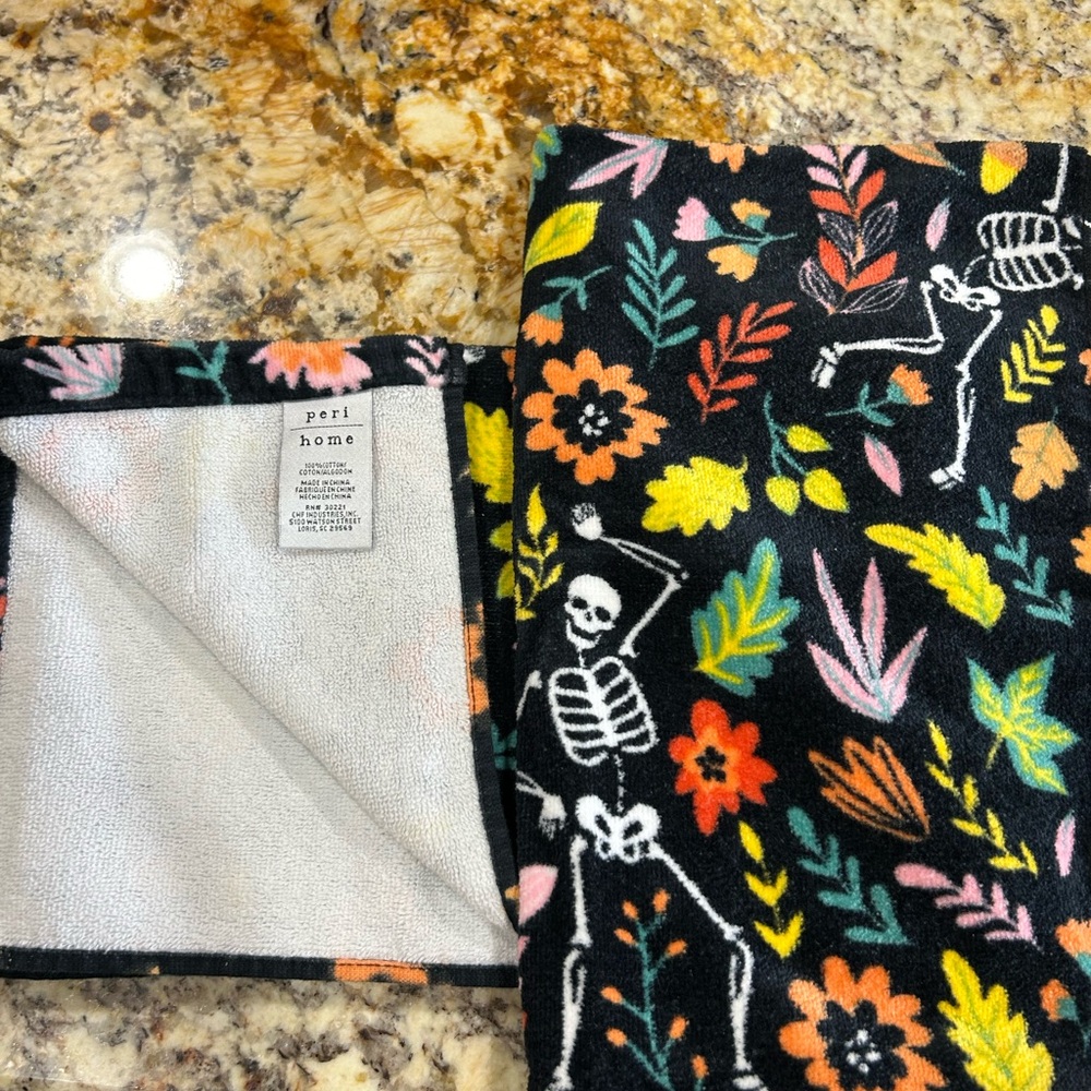 PLUSH Floral Skeleton hand towel set. Washed never used. No stains.